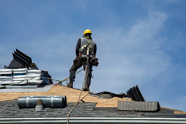 Professional Roof Replacement technician working in Clinton, WI